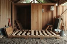 Photo-style image for "How to Build a Shed Base Step by Step: A UK Beginner's Guide" showing how to build a shed base step by step